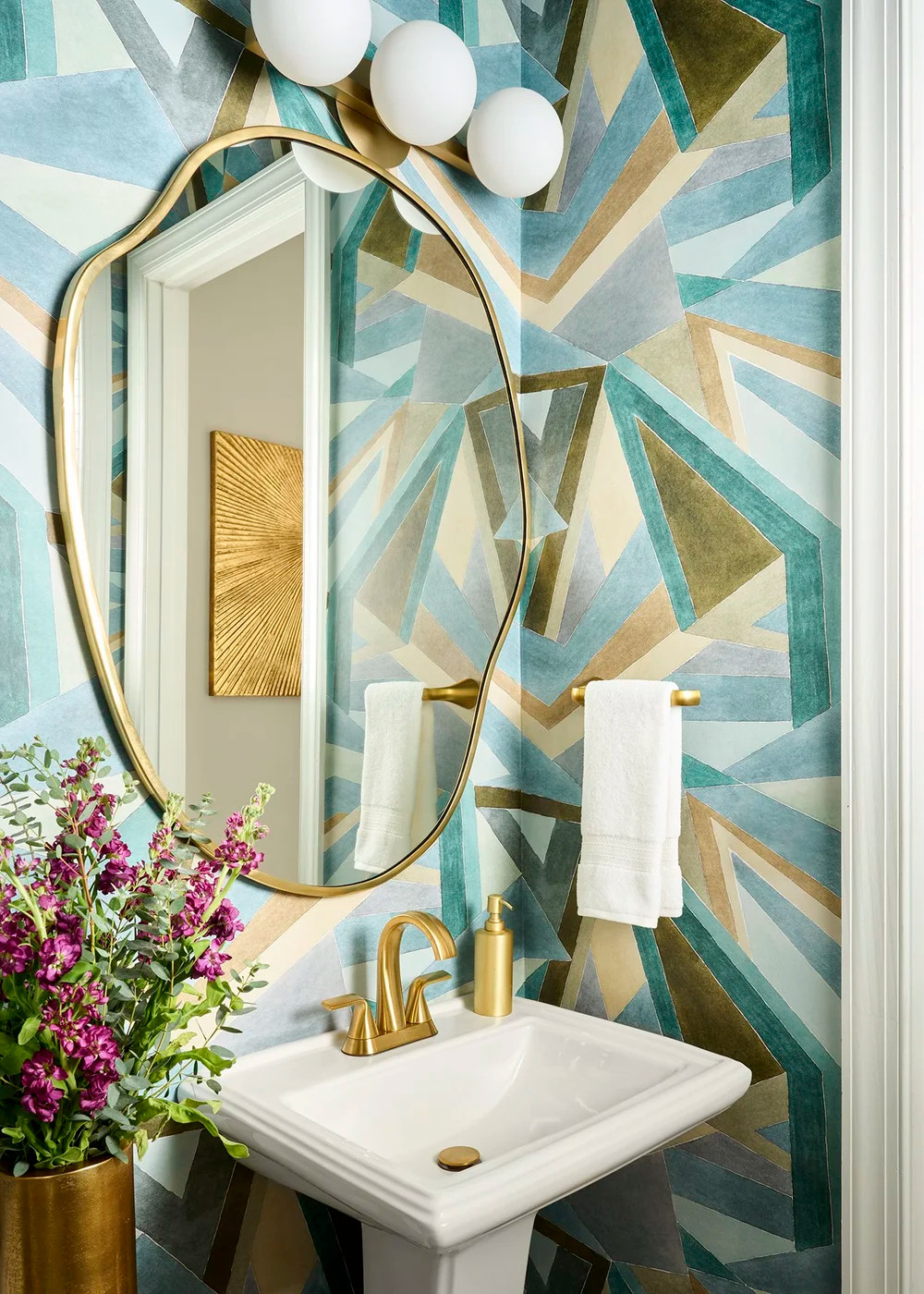 #WallpaperWednesday 💙 Bold wallpaper isn't just for large spaces. This geometric powder room proves that pattern, color, and a little personality can completely transform even the smallest footprint. Soulful Maximalism is all about creating spaces that leave a lasting impression—one wall at a time.

#WallpaperWednesday #StatementWallpaper #PowderRoomDesign #SoulfulMaximalism #InteriorDesign 

 #LTKHome