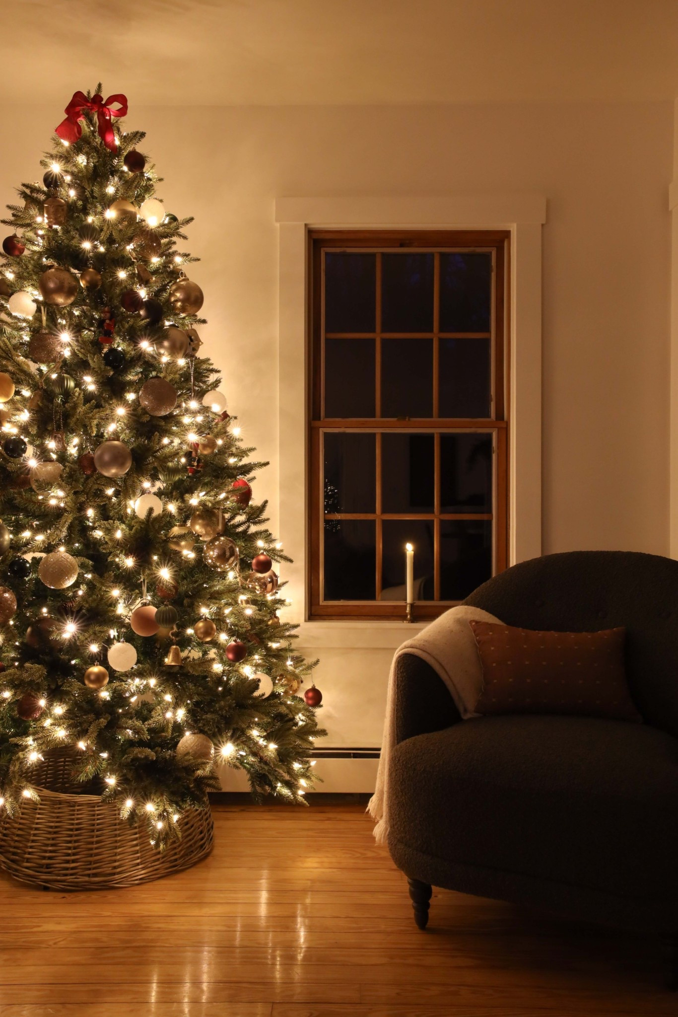 Christmas decorating made easy - a prelit Christmas tree, organized ornaments, and candles in the window. 

#LTKHome #LTKHoliday