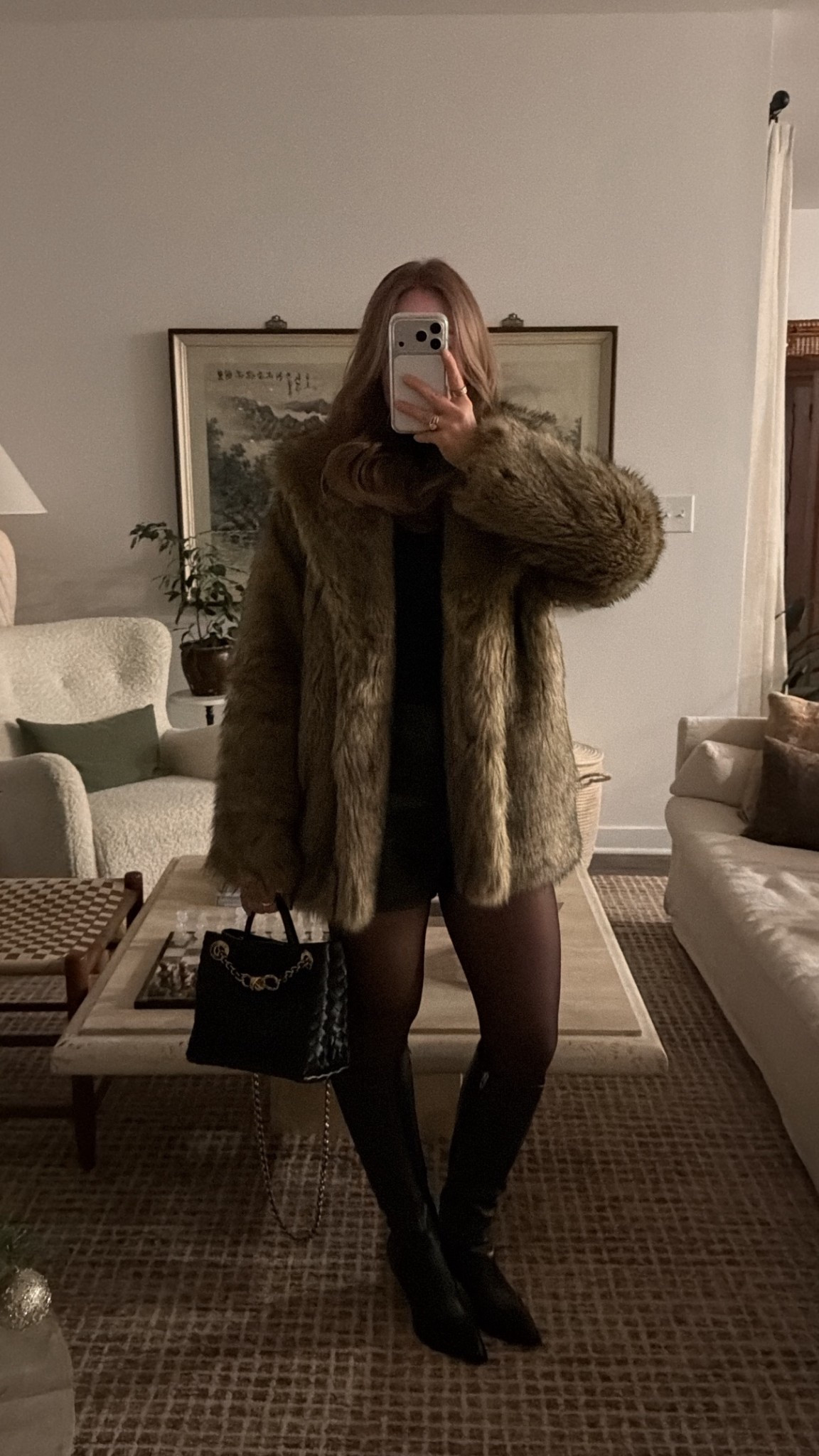 1/1/26 New Year’s Eve outfit details — but also a great winter going-out look. I’m wearing knee-high leather boots with a low heel (comfortable enough to stand around in), black Amazon stockings, leather shorts from Zara, and a black Commando bodysuit. The fur jacket I’m wearing is an older Abercrombie style, so I linked a similar option, and I finished the look with my Bottega bag. Classic, elevated, and easy to rewear all winter.


#LTKSeasonal