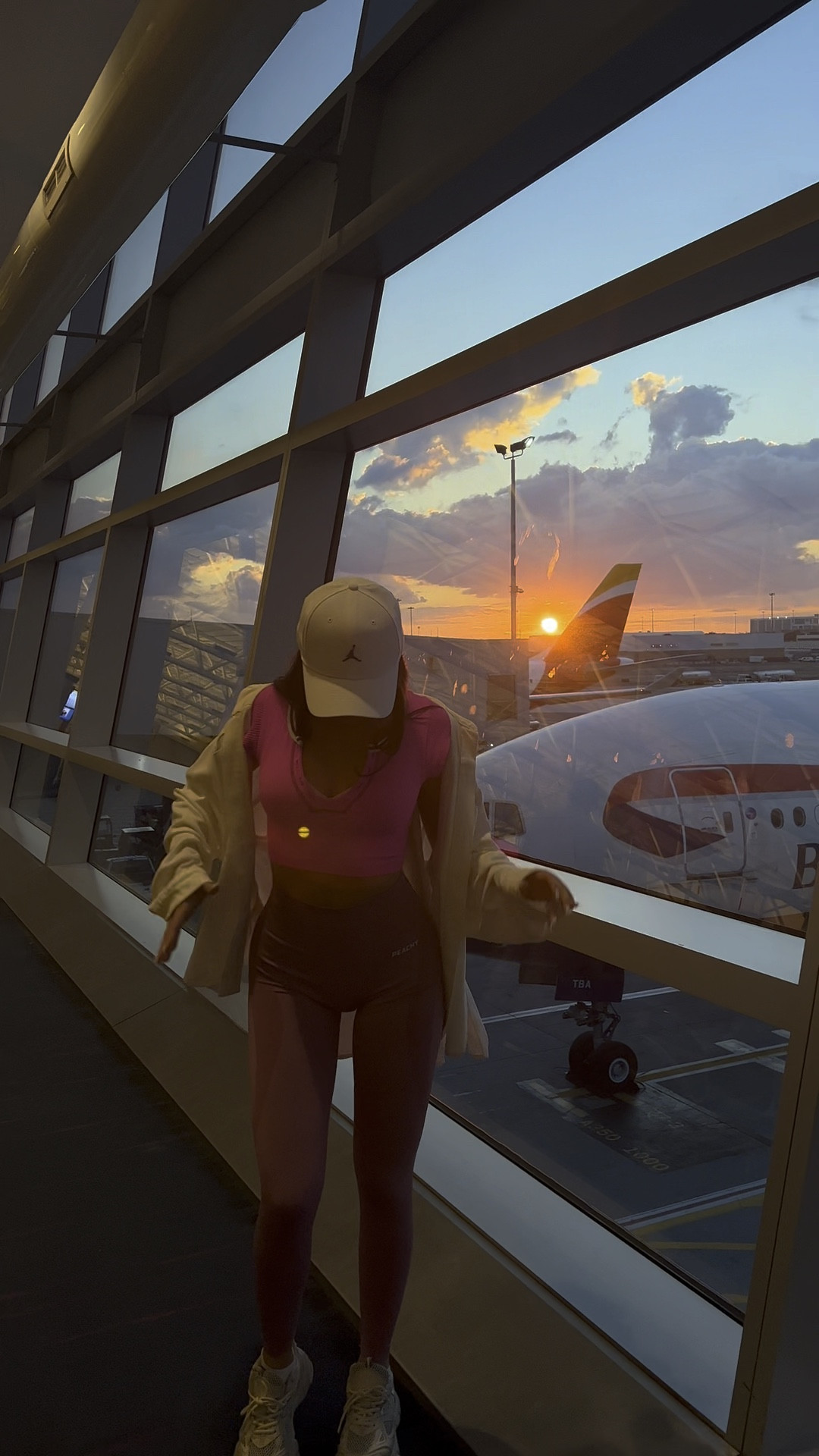 Air port outfit, pink cropped top, gym leggings, white trainers, AxelArigato, puma

#LTKfitness #LTKeurope #LTKstyletip