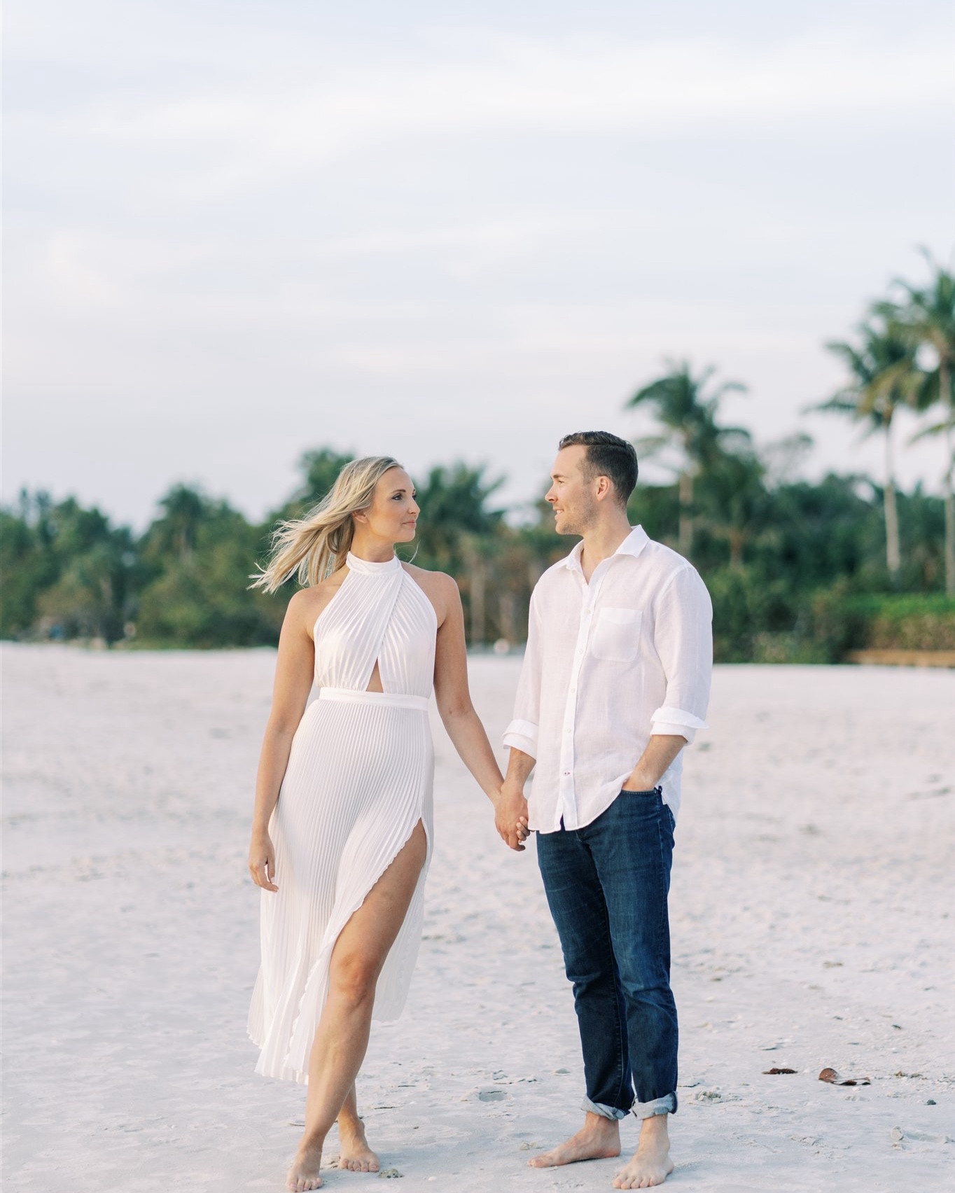 Think the location is everything when it comes to engagement photos?! 👇🏻

As a wedding planner, Taylor knew exactly the vibe she was wanting with her Naples engagement photos - fun, classic and beachy and exactly how to style her and her fiancé, AG. She paired a romantic, white silk dress styled with AG in a white linen shirt for their beach engagement photos. 

White engagement dress - rehearsal dinner dress - white dresses for brides - beach engagement outfits - white linen shirt men's - men's style - engagement photoshoot 

#LTKWedding #LTKMens #LTKStyleTip