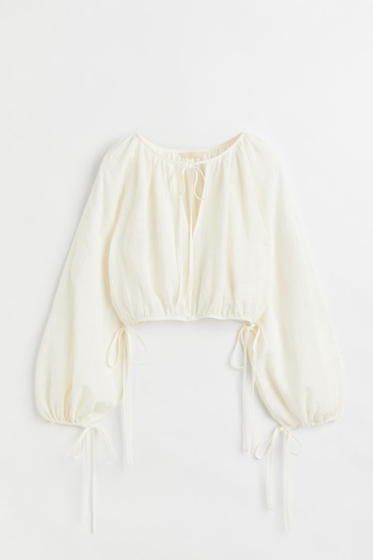 New ArrivalOversized crop blouse in woven, textured fabric. Round neckline with gathers and a V-s... | H&M (US)