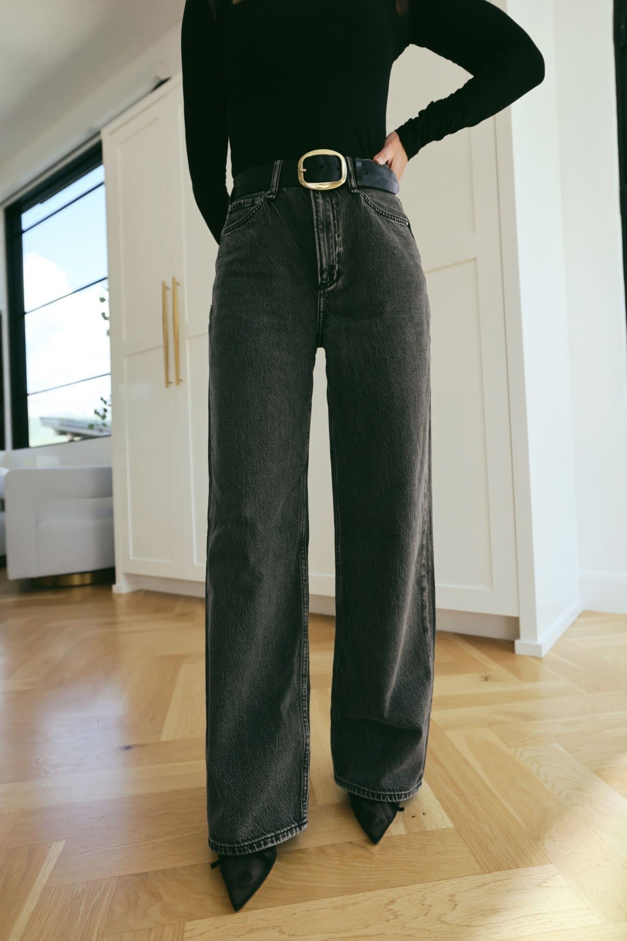 This pair of jeans has been a Busbee best-seller for many months—and I completely understand why. The fabric is featherweight (read: heavenly), the dark grey wash feels fresh, and the relaxed drape is flattering without being sloppy.

I personally love the longer length and subtle puddling at the ankle. It’s chic, effortless, and elongating with heels. But! If you live somewhere rainy or snowy, I get that this length may not be ideal. City walkers—consider a platform or slight heel to keep things clean. I’ll pair these with my black wedge snow boots in the winter.

And… Run, don’t walk—they’re on major sale right now.

#LTKSeasonal #LTKSaleAlert #LTKOver40