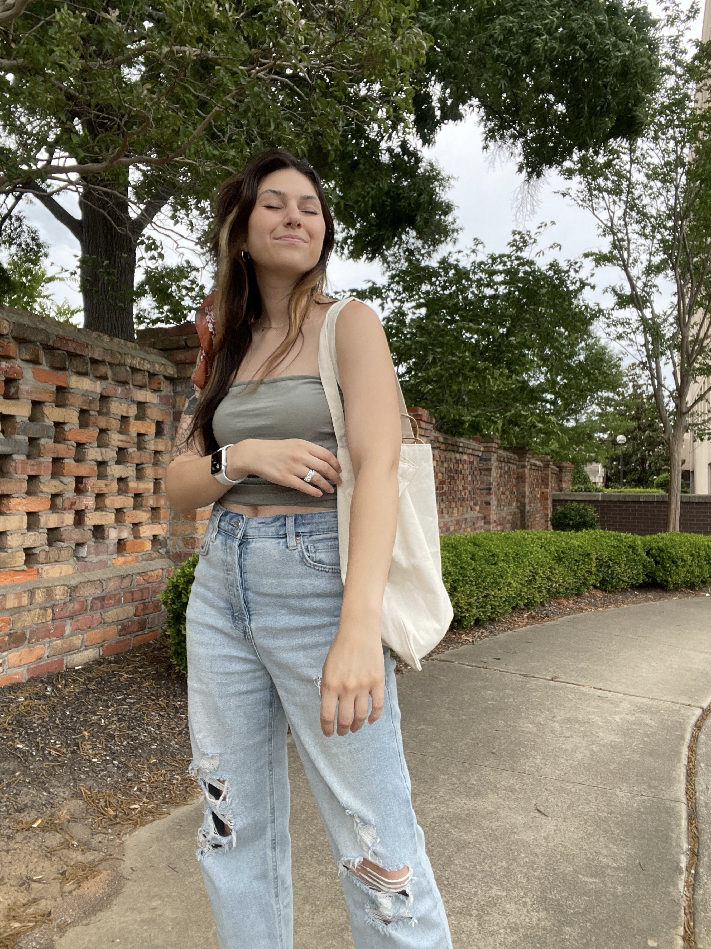 Women's casual summertime outfit, perfect outfit to spend the morning at the farmers market or thrift shopping and getting coffee. I am wearing target light wash high waisted jeans, a green tank top from H&M, a canvas tote bag, and brown hair scarf. The top I linked similar ones because I do not believe the original is in stock. #summer #ltksummer #summerfashion #summerstyle #summerlooks #womenfashion #casualfashion #casualstyle #summer2025 #ltktarget #target #HM  

 #LTKSummerEdit #LTKSeasonal #LTKFindsUnder50