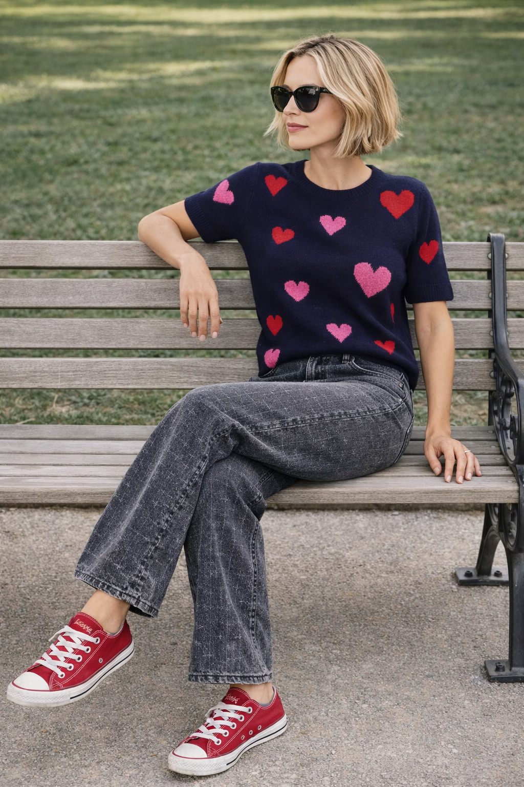 Valentine's casual outfit. Loving the Chucks to go with the sweater. They are a special edition and even have the word 'Love" on the sides. #valentinesoutfit #galentine #heartsweater #redshoes 

 #LTKValentine #LTKootd #LTKOver40