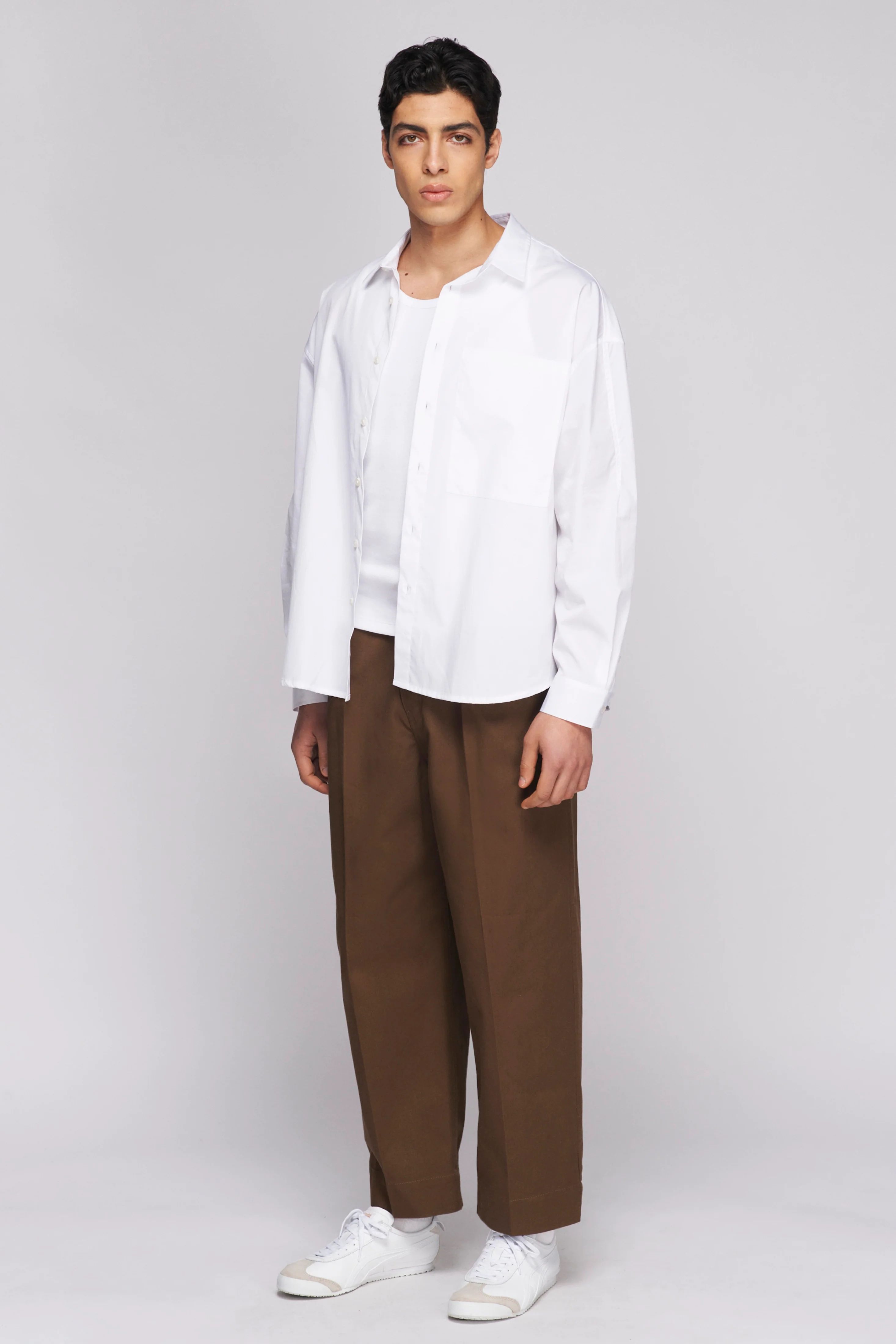 Unisex Boxy Poplin Shirt$1285.0/5 All reviewsShow reviews draweror 4 payments of $32 with Sezzle ... | Kotn