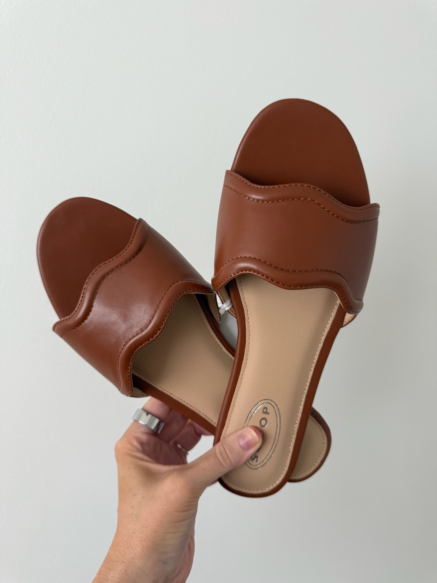 These best selling sandals from Walmart are still in stock and come in multiple colors. I got my normal size but if you are between sizes, I recommend sizing up 1/2 size. Spring sandals // summer sandals // brown sandals // comfortable flats // Walmart 

#LTKShoeCrush #LTKSummerEdit #LTKFindsUnder50