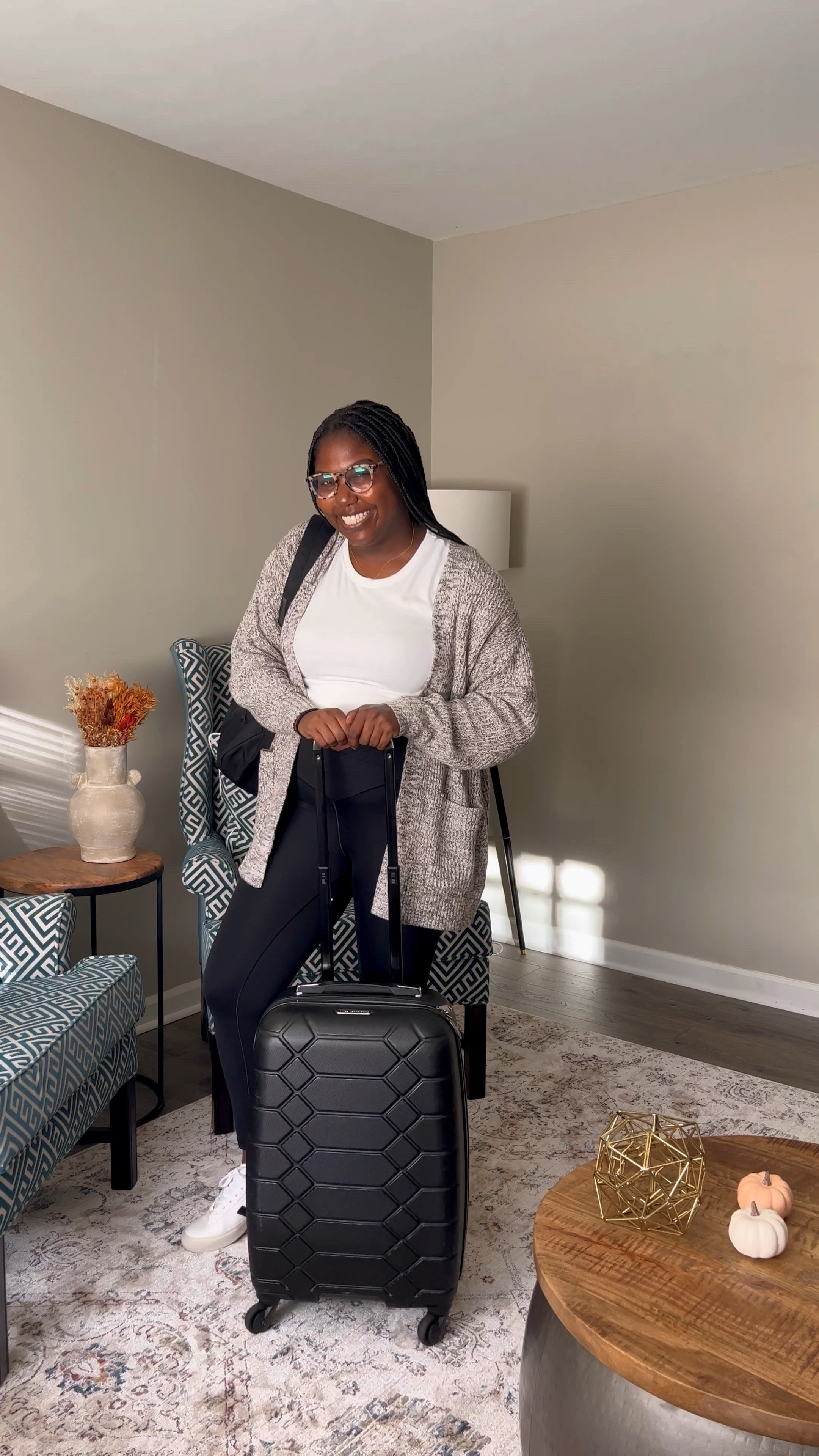 Easy airport/travel day outfit: a crop top, a cardigan, leggings, and sneakers! 

#LTKunder50 #LTKtravel #LTKstyletip