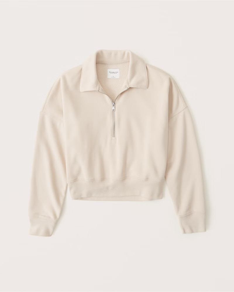Women's Long-Sleeve Polo Half-Zip Sweatshirt | Women's Tops | Abercrombie.com | Abercrombie & Fitch (US)