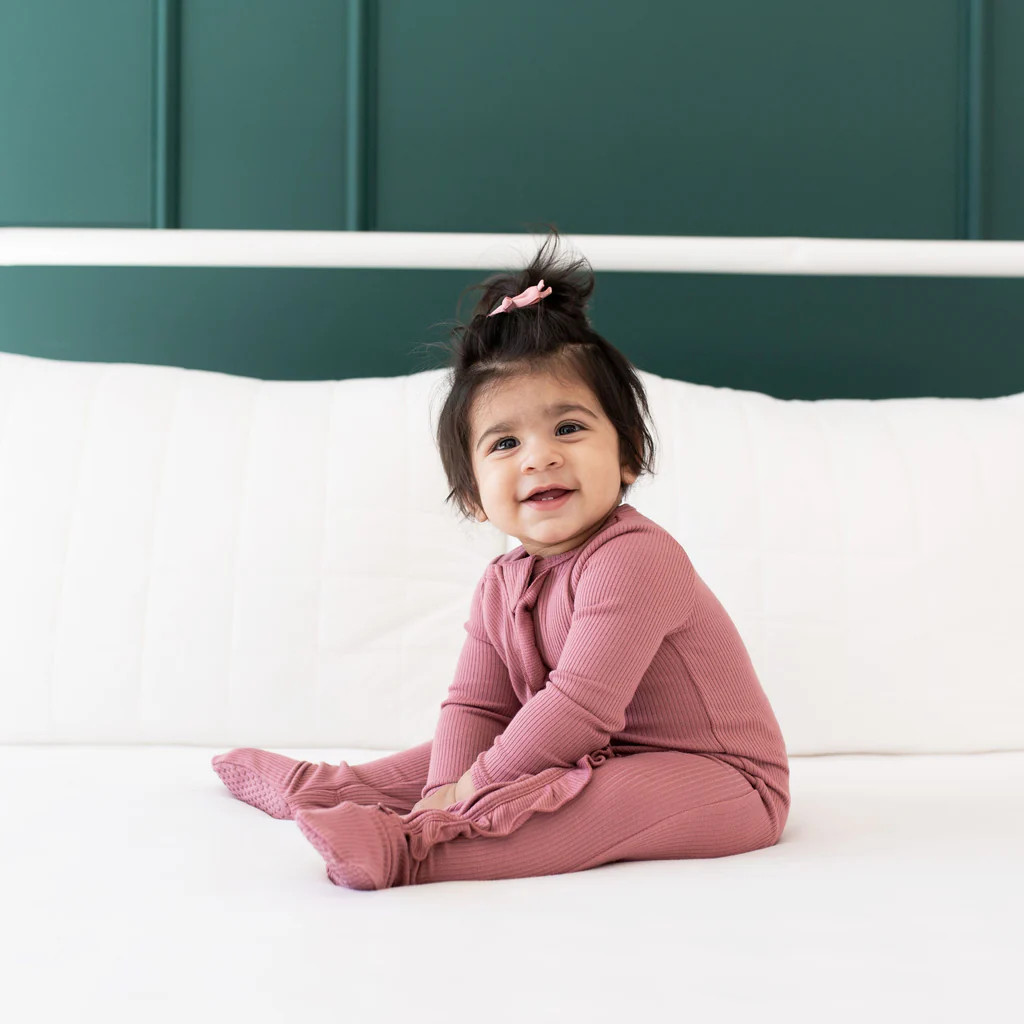 Ribbed Ruffle Zipper Footie in Dusty Rose | Kyte Baby