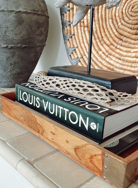 This hardcover Louis Vuitton book is one of my favorite coffee table books! 

#homedecor #coffeetablebook

#LTKHome #LTKFindsUnder100 #LTKStyleTip