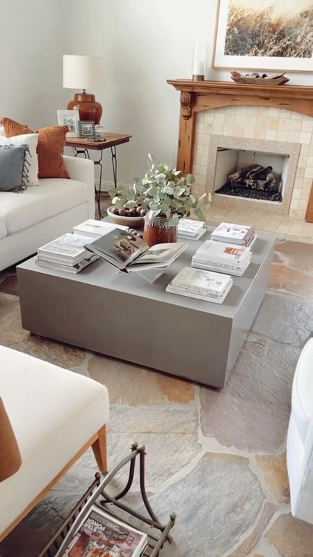 Love this coffee table but it’s heavy! Took several of us to lift it up and pull out the rug which was soaked from the flood we had. 😩

Just now getting it restyled and now on the hunt for a new area rug. 👀

I linked some of my favorite coffee table books and accessories here.
…………………………………………………………
#ltkhome #shopltk #livingroom #coffeetable #coffeetabledecor #coffeetablestyling #concretecoffeetable #coffeetablebooks 
