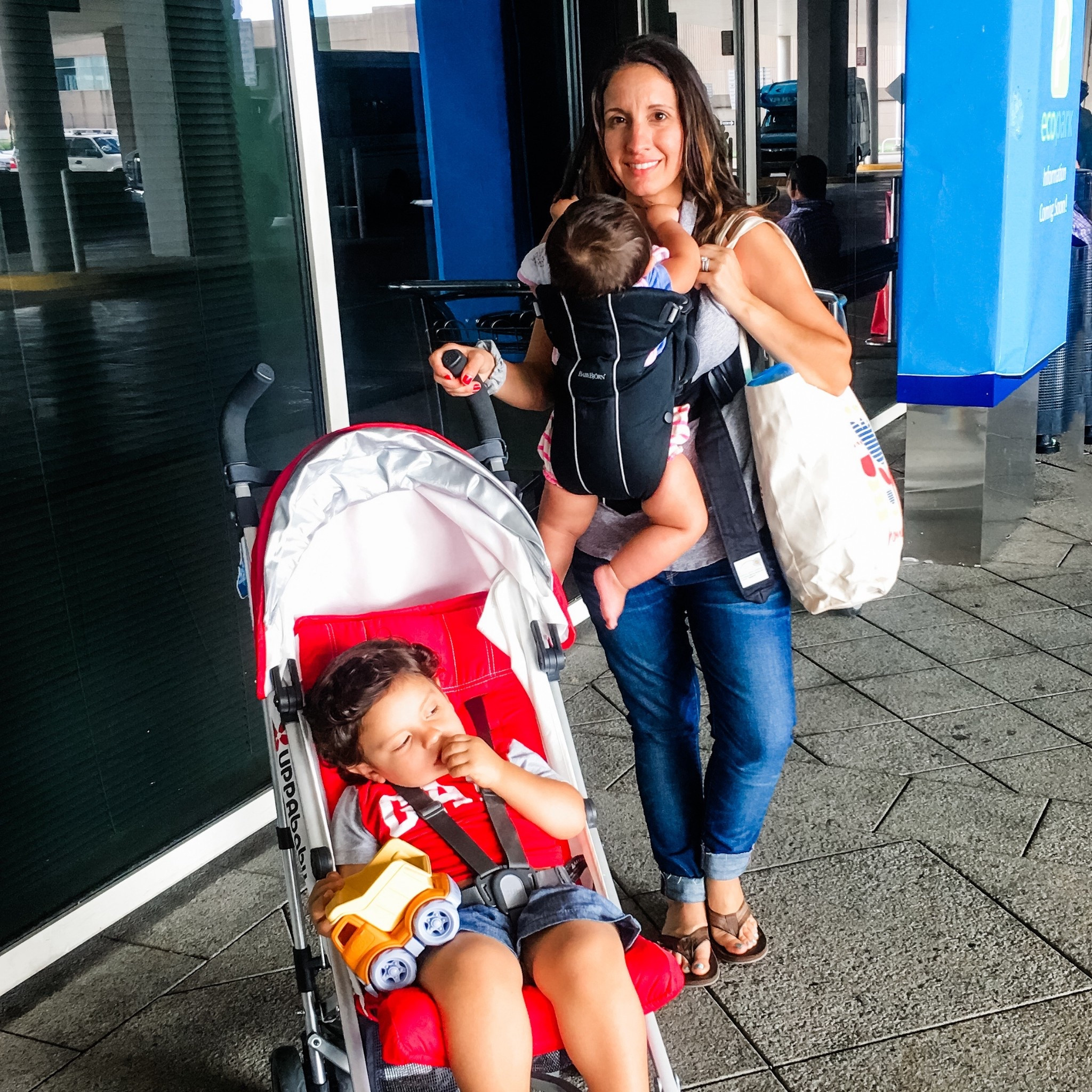 Grainy photo, but these 2 items made travel with a baby and toddler easier. 
I love the Uppababy stroller and the Baby Bjorn. It helped me be hands free for one little one while taking care of the other. 
Mom life 
Travel with kids must have 
Travel with baby must have 
Toddler travel must 