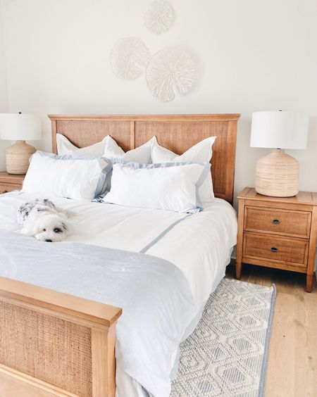 Coastal guest bedroom
White and blue bedroom design
