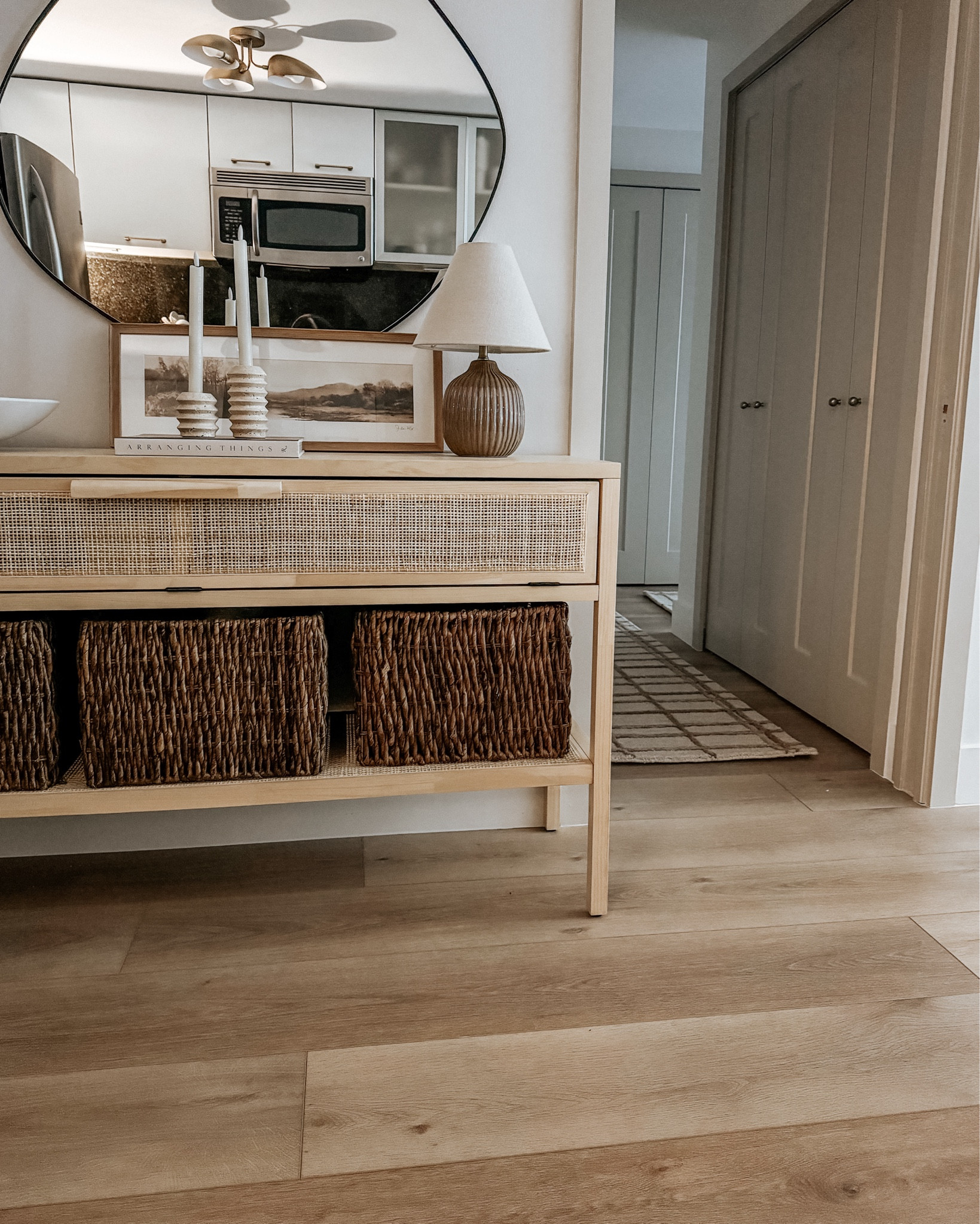 Love this view of my entryway table and updated hallway! The styling gives fall vibes but there actually isn’t any clear fall decor which I love. This entry table isn’t available anymore but I linked similar options! 

#LTKSeasonal #LTKHome #LTKStyleTip