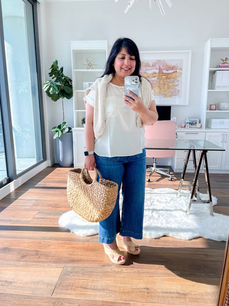 This versatile little satin pocket tee is on sale for under $15 today! The perfect layer for both workwear and casual outfits. Wearing it here in size petite large. Cardigan sweater draped over my shoulders also size petite large and also on sale! Anthropologie Colette jeans size 32 petite. Marc Fisher raffia wedge sandals true to size. Target style straw tote bag.

Summer outfit, jeans, sandals, travel outfit, everyday outfits summer, casual everyday outfit, spring sweater, summer sweater, cardigan sweater, satin top, satin blouse, Loft top, Loft outfit, Anthropologie jeans, wedge sandals, raffia sandals, straw tote bag

#LTKStyleTip #LTKFindsUnder50 #LTKMidsize