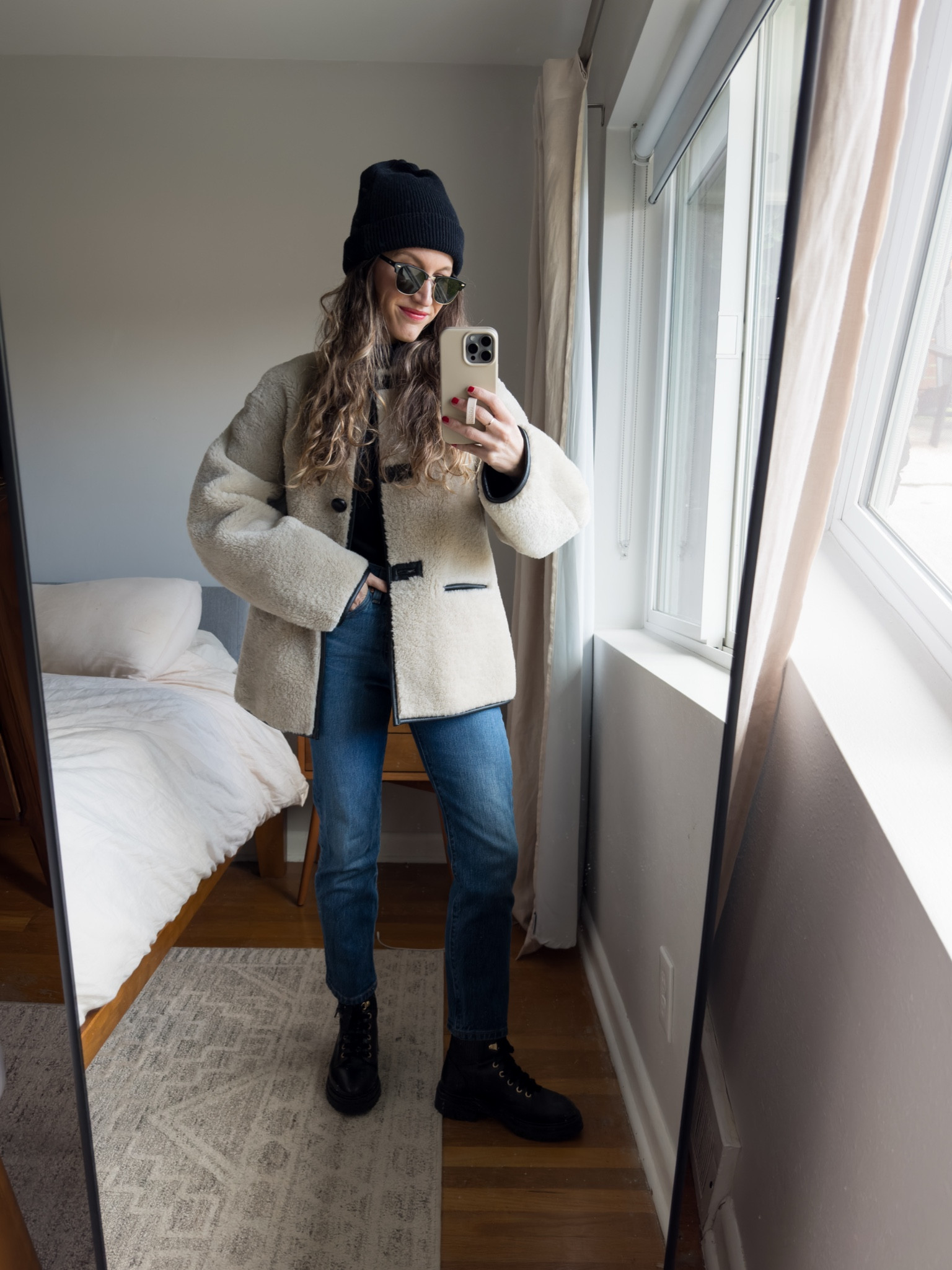 Daily Look 11.29.24

Faux fur coat from Mango currently 30% off, fits oversized but I got my true size, XS. Old J.Crew turtleneck; similar linked. Levi’s denim, 24, I took my smaller size. Sèzane boots, run a little big but stay true to size if wearing with thick socks. Old Cotton beanie from Madewell, linked a current style. Quince sunglasses  

#LTKOver40 #LTKHoliday #LTKSaleAlert