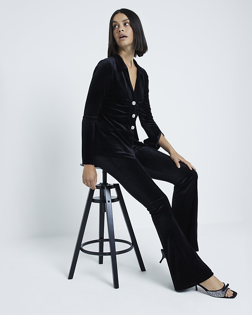 Black Velvet Bootcut Trousers | River Island (UK & IE)