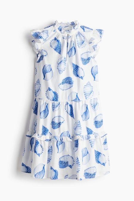 Blue and white seashell print dress 

#LTKstyletip #LTKfindsunder50 #LTKSeasonal