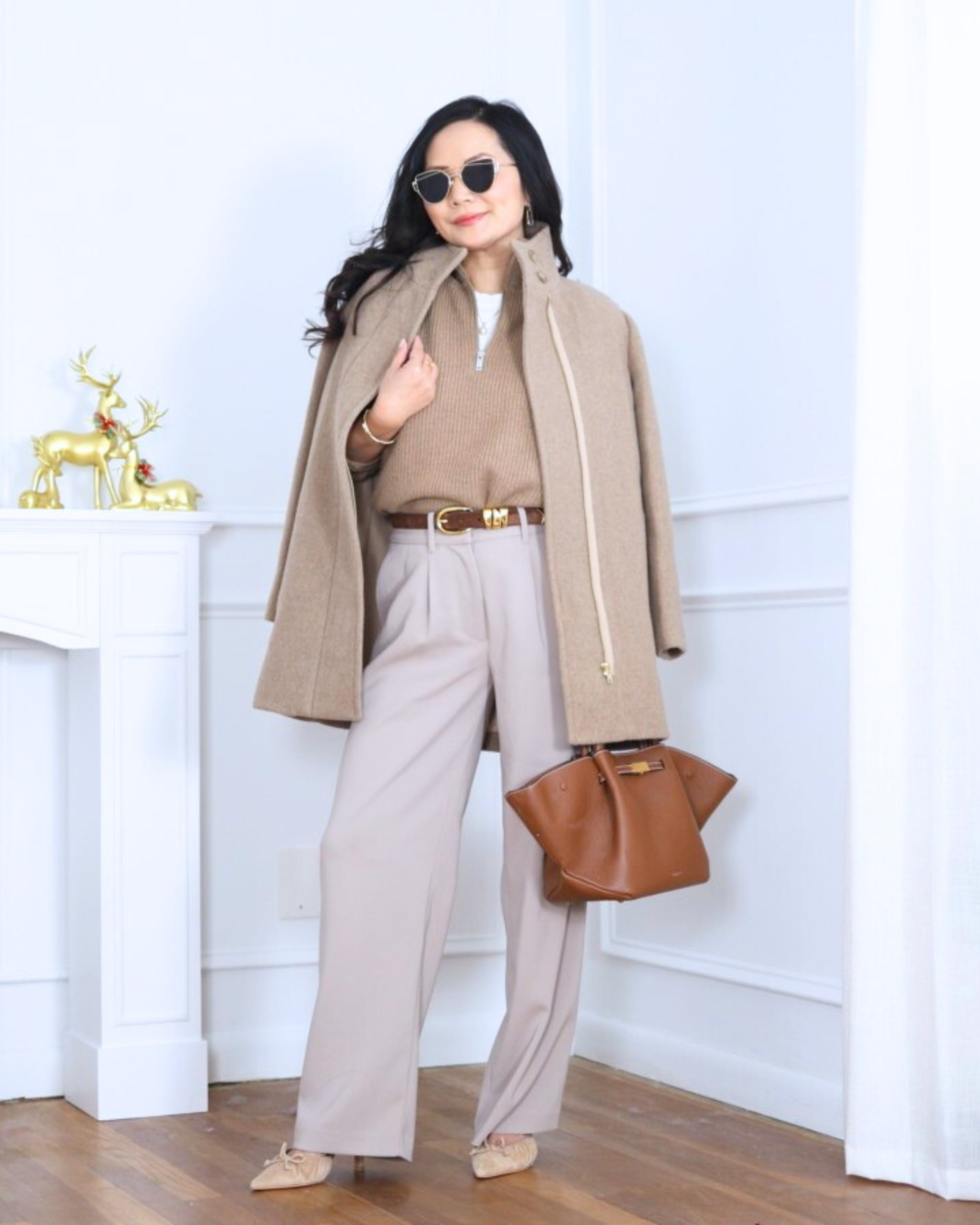 City coat from J.Crew Factory layered over a quarter-zip sweater, tee, and pants from Quince. Clean, polished, and effortlessly put together—this is one of those easy outfits that feels comfortable but still looks sharp and intentional. I’m 5’2, wearing size XS.

#LTKootd #LTKOver40 #LTKPetite