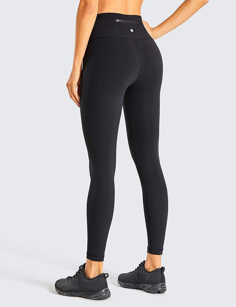 CRZ YOGA Women's Naked Feeling Light Running Leggings 25 Inches - High Waist Workout Tights Zip Pock | Amazon (US)