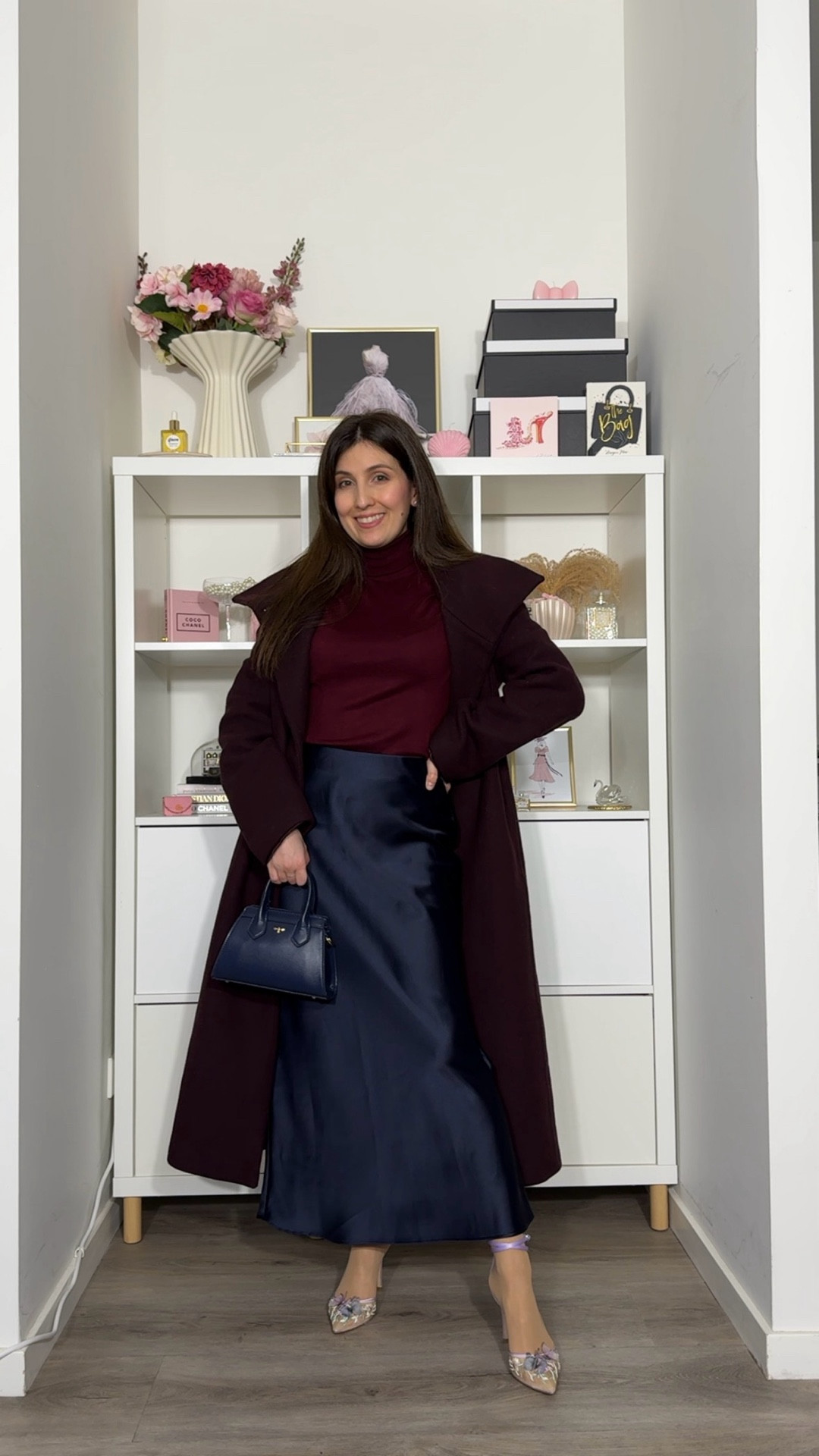 Day 3 of holiday looks!

Plum, burgundy and navy is the ultimate holiday colour combination! Add to the look a fabulous pair of shoes and you have most beautiful holiday look!

For this outfit I combined a satin navy skirt with a burgundy turtleneck knit and 3D butterfly shoes. Because this year there are only 6 holiday looks I try to include different levels of glam and create for different occassions. I created this one with a family Christmas dinner in mind. Cozy yet elegant! The satin skirt gives the glam, the burgundy knit brings the holiday vibe and cosiness and the butterfly shoes add a unique and delicate touch to the look!

Do you like it? Would you wear it?

#LTKfestive #LTKpartywear #LTKpetite