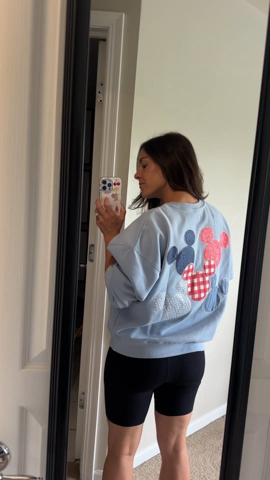 this target disney sweatshirt is the kind of piece you throw on and still feel put together
soft, lightweight, and slightly oversized with the cutest disney detail on the front… but the back is what makes it

easy casual outfit with biker shorts now, but will be perfect with leggings or jeans for fall

I’m wearing a medium