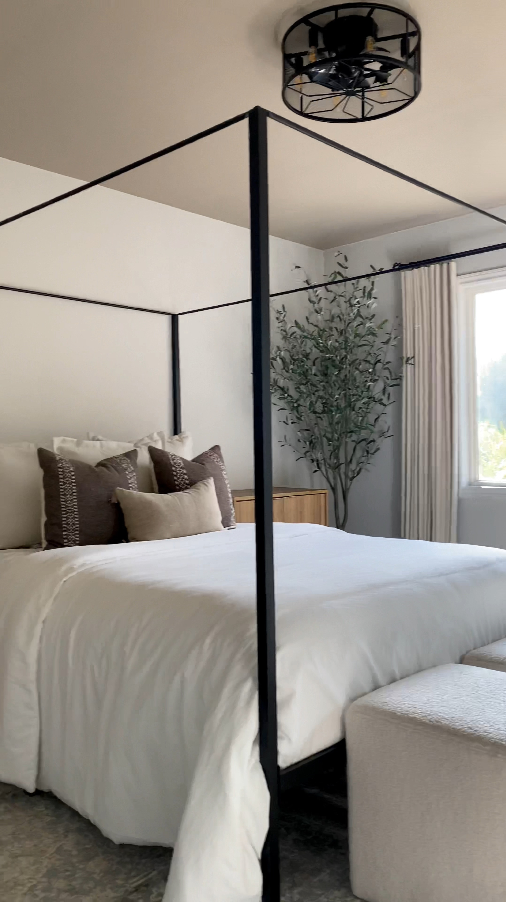 Guest bedroom decor. Guest room decor. Canopy bed. Affordable home decor. Beige drapes. Ivory drapes. Blackout curtains. Faux olive tree. Boucle ottoman. Large nightstands. Wooden cabinet. Amazon home decor. Amazon decor. Vintage rug. #amazonhome #amazon

#LTKHome