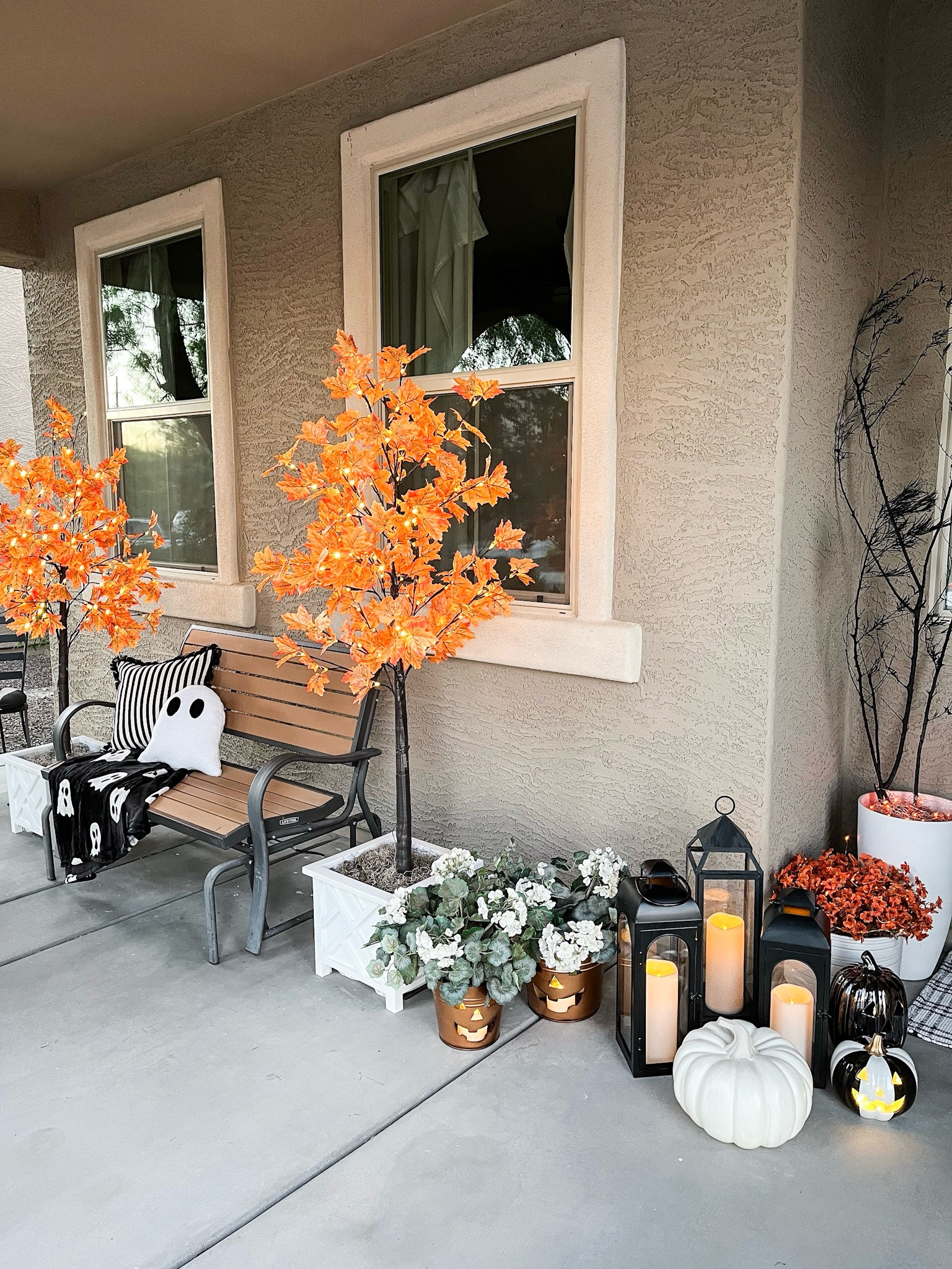 Halloween front porch!

Light up trees | white planter | black lanterns | faux flowers | outdoor flameless candle | ghost pillow | ghost throw blanket | striped pillow | orange string lights | dried Spanish moss | rocker bench | copper jack o lantern buckets 

#LTKHome #LTKHalloween #LTKSeasonal