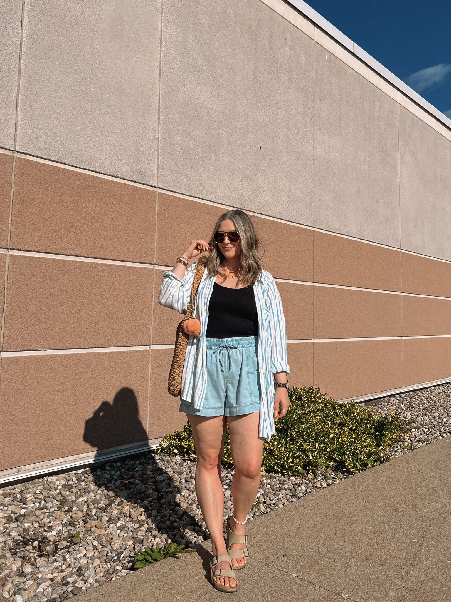 Easy summer outfit! Wearing L in the chambray shorts and basic black tank (Canadian tank link under “similar products”.) My striped button down is old from aerie, linked similar. Birkenstock sandals fit TTS

#LTKsummer #LTKmidsize #LTKstyletip