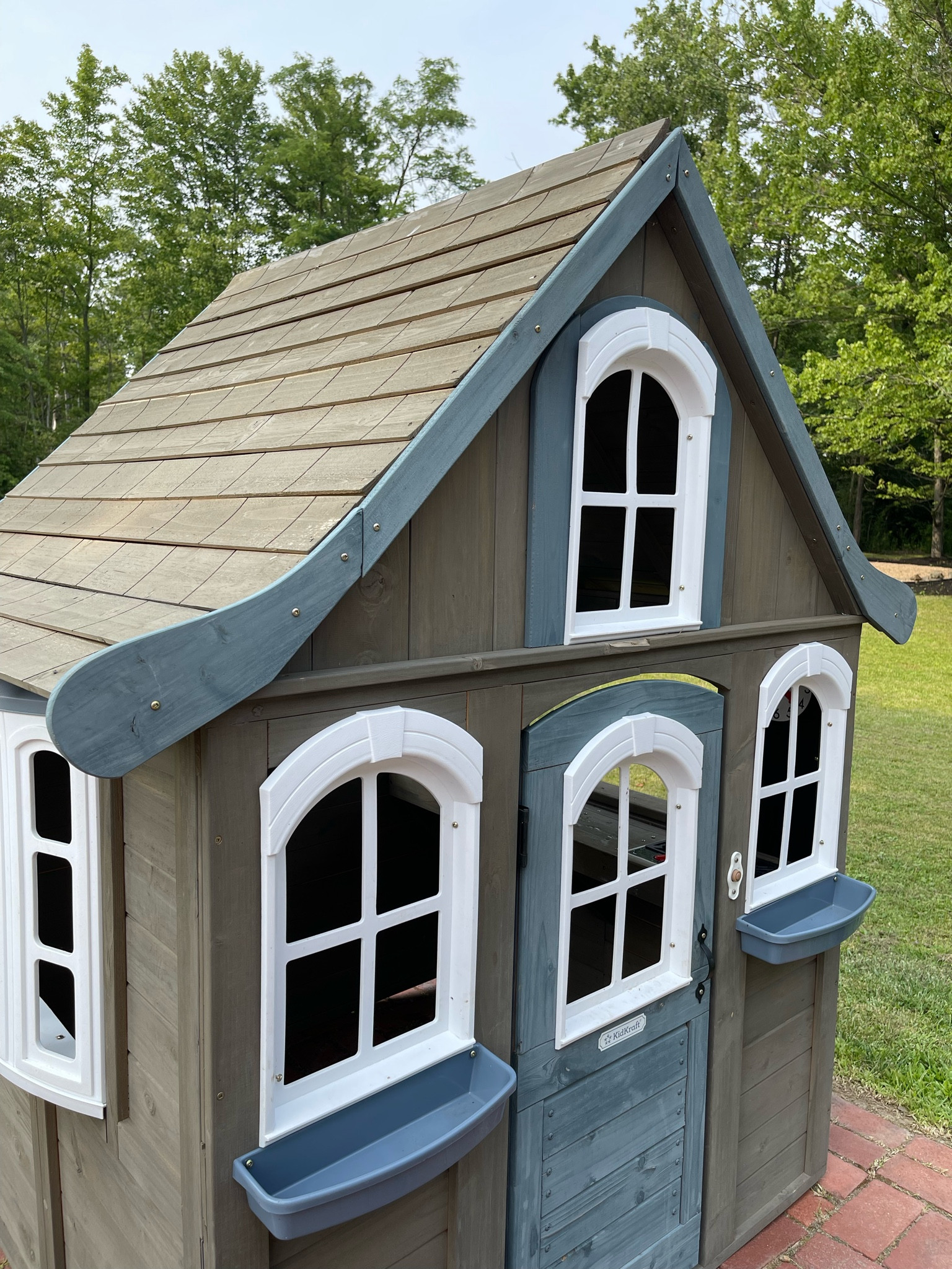 This cute little play house is on sale today - $200 off! 🤯 The kids love it! It has a play kitchen, chalkboards, a window & functional doorbell. Plus - look how cute the planter boxes are 🥹 can’t wait to fill them 🌷

#LTKFind #LTKxNSale