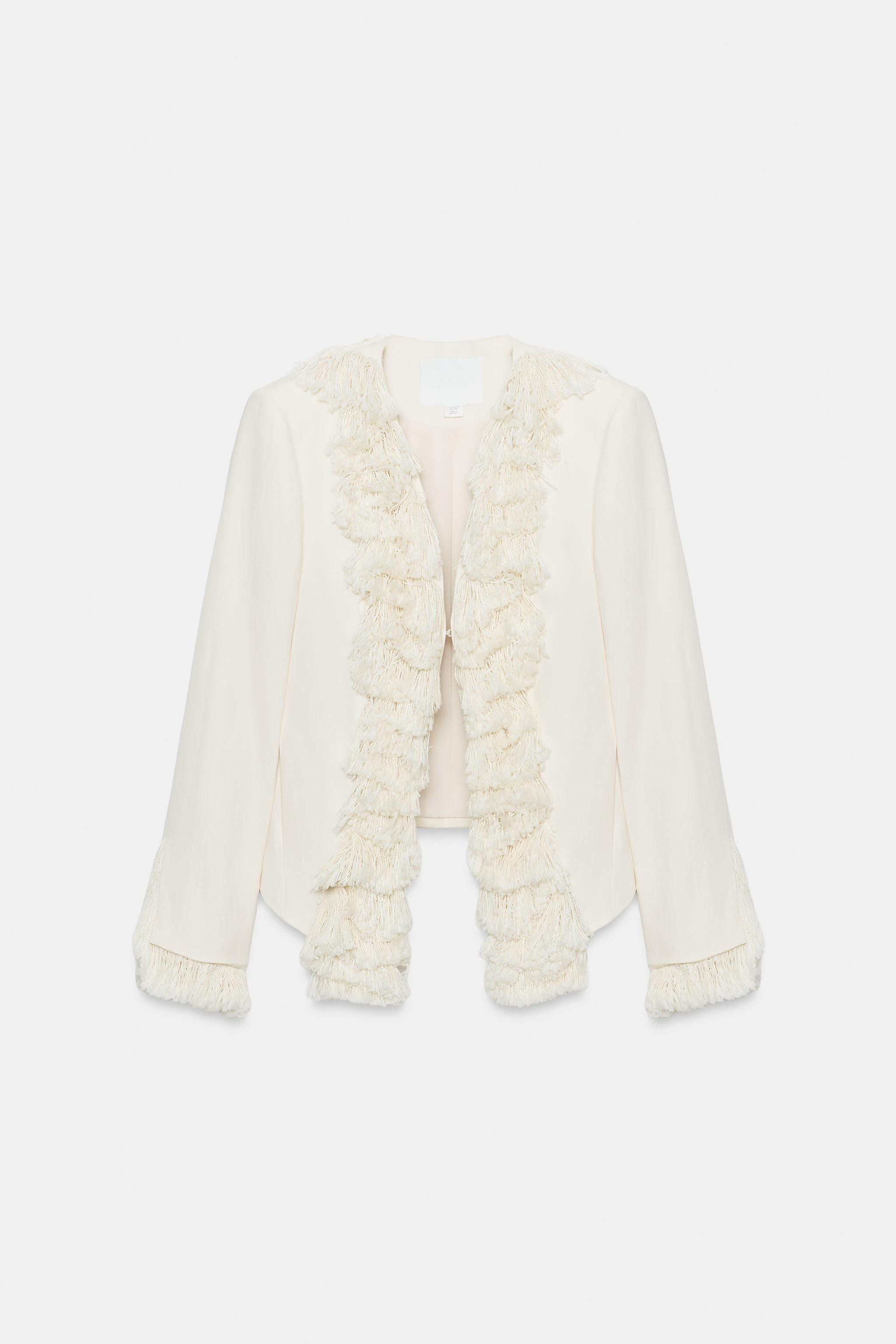 ZARA WOMAN COLLECTIONJacket made with 36% linen blend yarn. V-neck and long sleeves. Side pockets... | Zara US