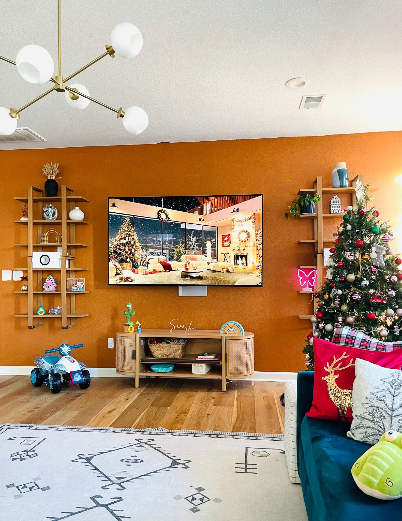 Living room currently changed as my daughters play area using the burrow shelves to display her toys and do toy rotation and tv unit acts as the  toy storage … made it kid proof with no wiring’s all were pulled from wall and sharp edges are cushion protected . 

#LTKSeasonal #LTKstyletip