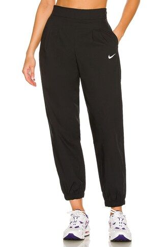 Nike NSW Icon Clash Woven Pant in Black from Revolve.com | Revolve Clothing (Global)