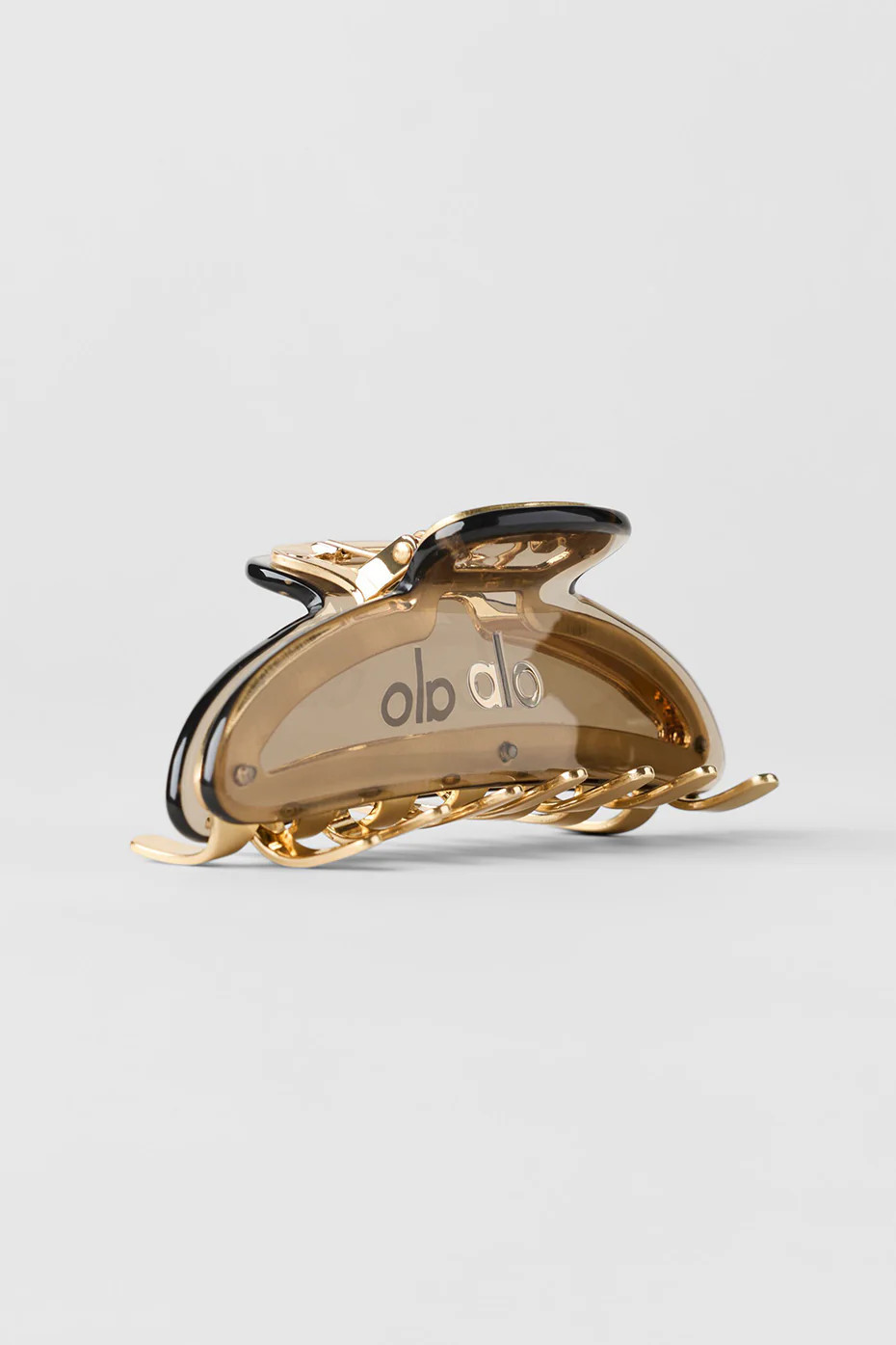 ALO | Acrylic Illusion Claw Clip in Gravel/Brushed Gold | Alo Yoga