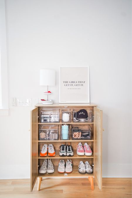 How to make an entrance! Use a cabinet to create storage and a drop zone for essentials.

#LTKSeasonal #LTKstyletip #LTKhome