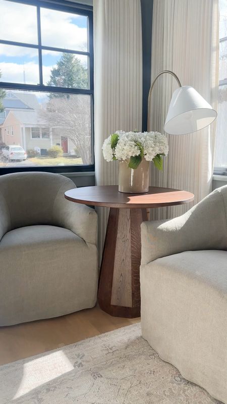 My beautiful, large walnut end table is on sale right now at Meco during the Presidents’ Day sale! Gray chairs. Dining chairs. Small accent chairs. Amazon faux hydrangeas. White hydrangeas. Arch Ron floor lamp. Office seating. Sitting area 

#LTKstyletip #LTKsalealert #LTKhome