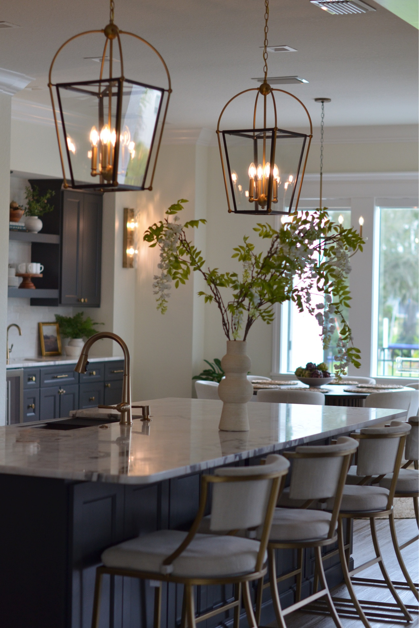 Kitchen views - counter stools, faux stem branch, pendant light, faucet 

#LTKhome