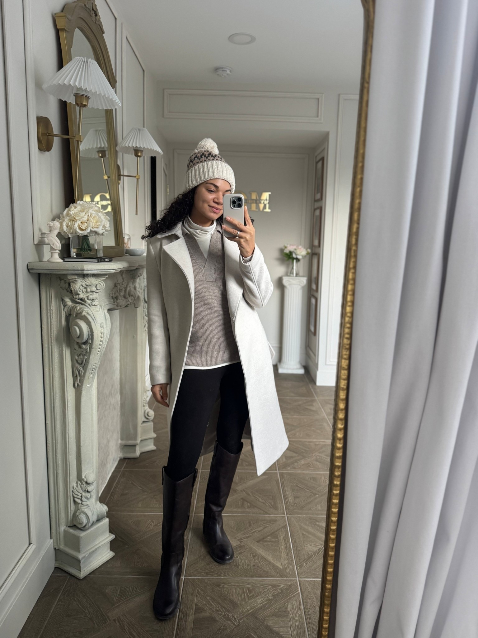 Riding boots winter outfit with leggings, a fair isle pom pom beanie, a turtleneck, polo sweater, and coat 

#LTKSeasonal #LTKootd