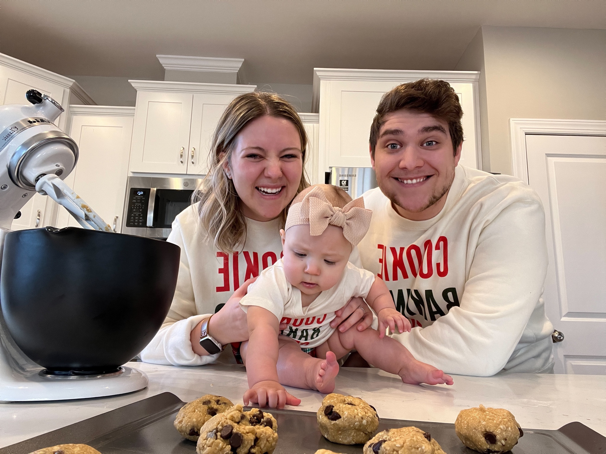 Starting new traditions this Christmas  - sweatshirts are from aspen + co, similar tops linked below | baby’s first Christmas, cookie baking, Christmas outfits, family matching, matching shirts, baby bow, baby Christmas outfit 

#LTKSeasonal #LTKfamily #LTKHoliday