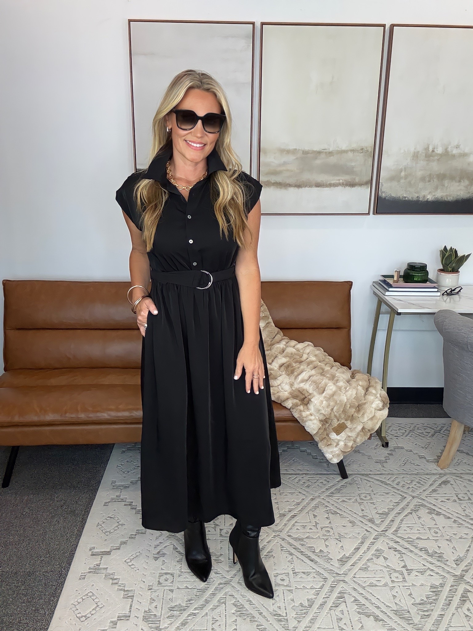 I had a full day of meetings and dinner plans afterward, so I wanted one outfit that could handle both. This black midi has an easy drape through the skirt, the belt pulls in the waist without feeling restrictive, and the button front gives you control over the neckline. I added heeled boots and oversized sunglasses and was out the door.

Black midi dress, belted shirt dress, office to dinner outfit, black boots, fall workwear, button front dress, women’s office style, transitional outfit, monochrome fashion, AudrieDollins

#LTKootd #LTKSeasonal #LTKOver40