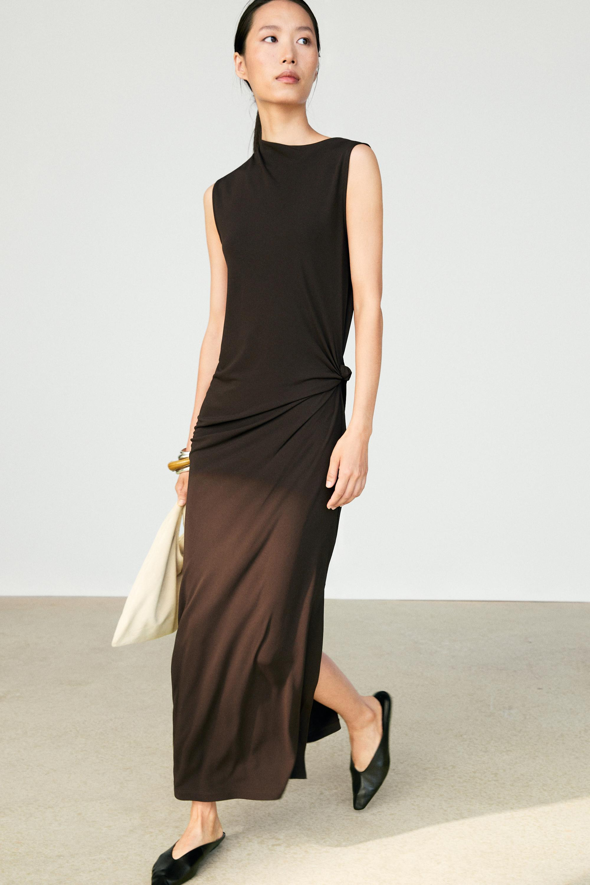 VIEW LOOK
Asymmetric ruched midi dress

 $200  Colour  Brown  Add to basket Colour Brown|Ref. 668... | Massimo Dutti US
