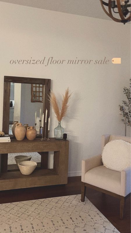 Oversized 71x32 floor length wooden framed mirror on sale. Great  quality, weight, and distressed look. Shop exact product below. 🏷️ 

oversized floor mirror. area rug. home decor. 

#LTKsalealert