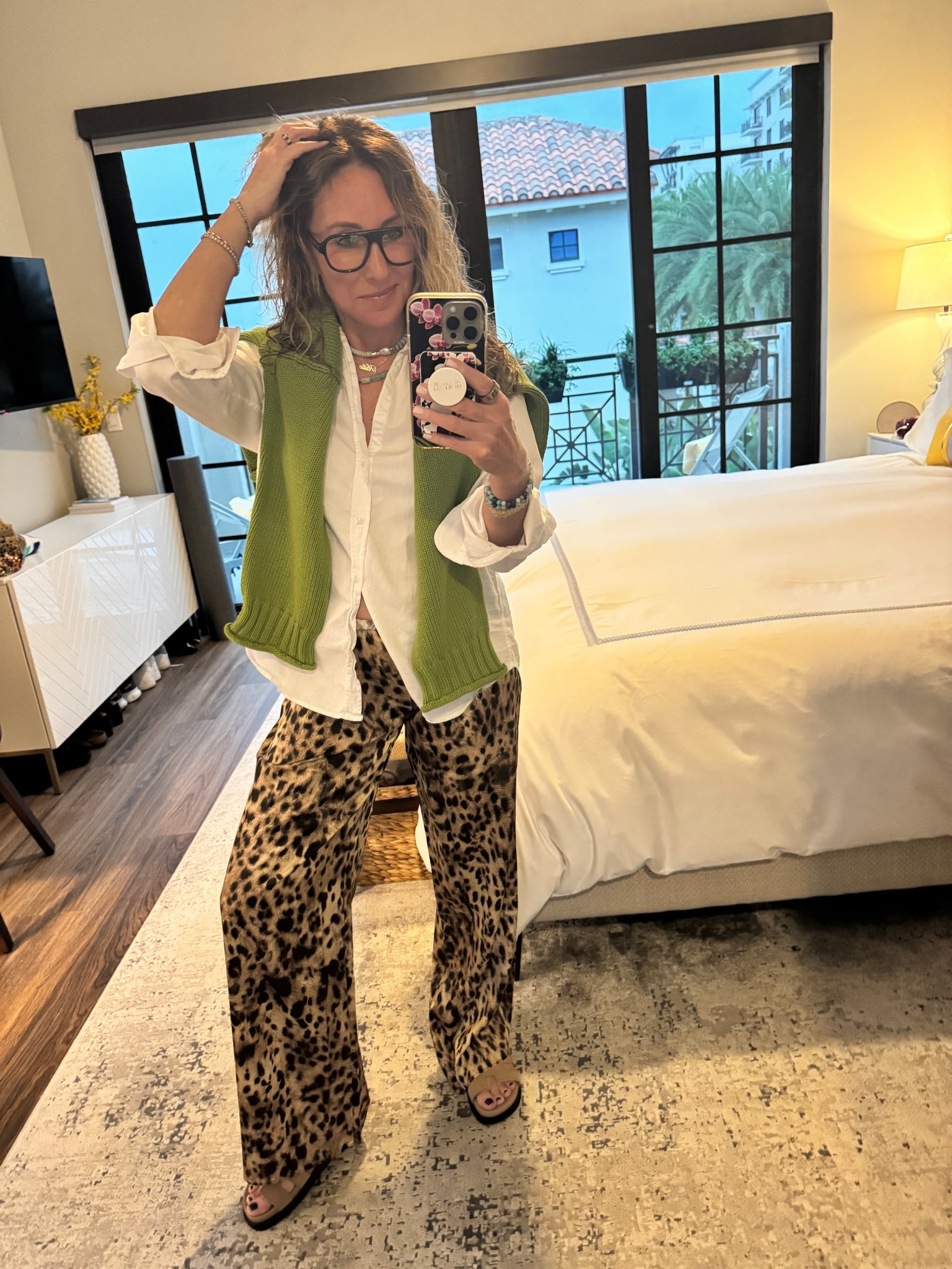 We had friends over to play couples Canasta. So it was an evening in, but it wasn’t just me and my PJs. So this was the next best thing. I’m really into these silky pants lately. For me, I love pairing them with something more structured like a button up or a sweater.

#LTKgrwm #LTKootd #LTKSpringSale