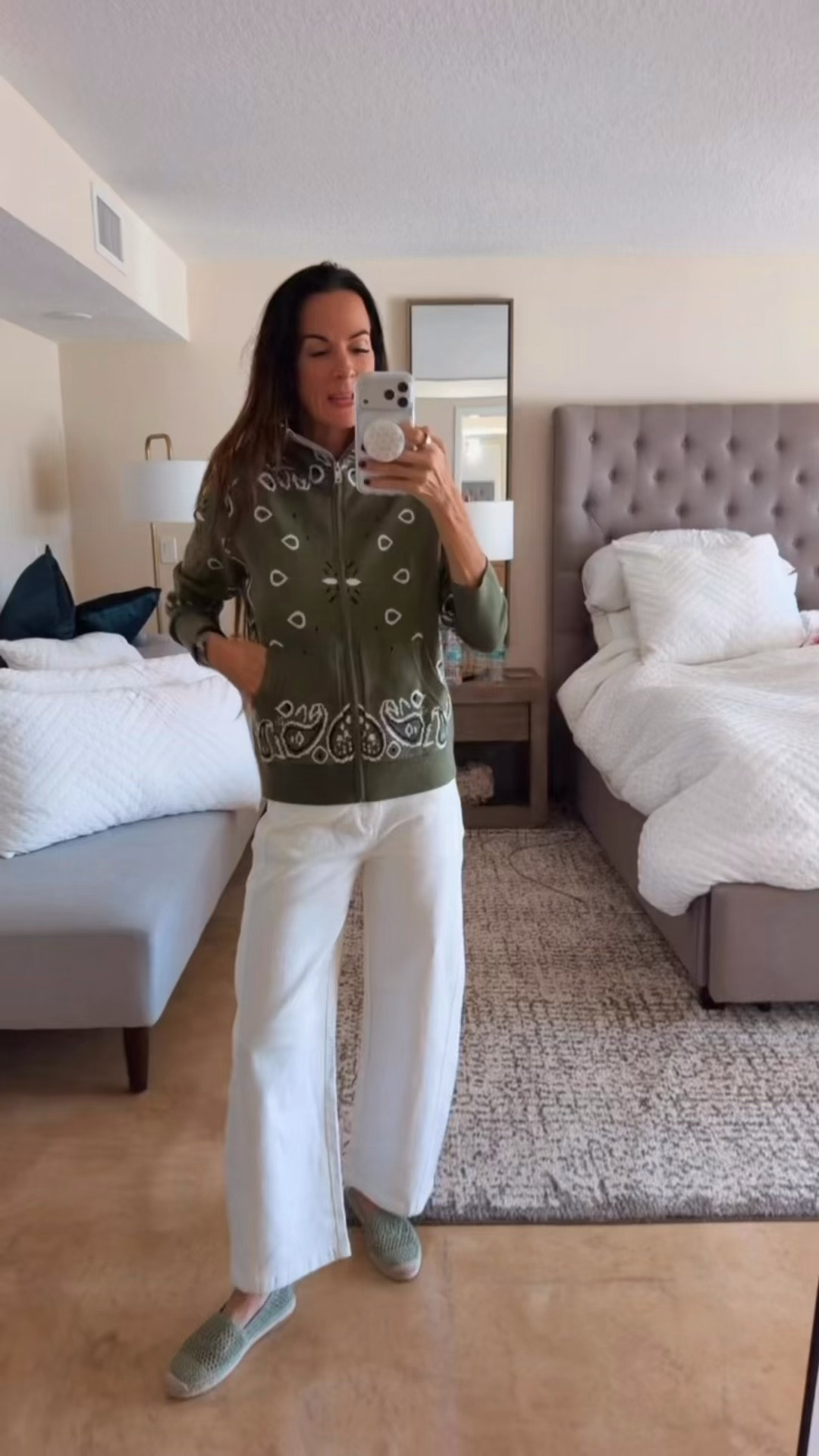 An Amazon outfit with a little attitude. 💚 Olive bandana-print zip hoodie, white wide-leg pants, and green flats—the easiest way to make casual feel styled. Wear the pieces together or mix them into your everyday rotation. Shop the whole look here!