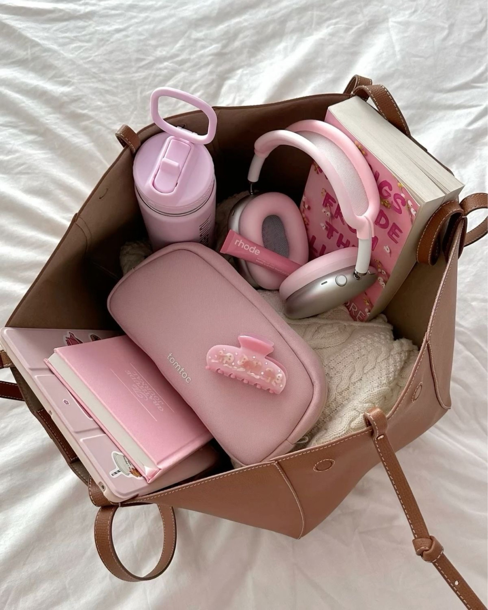 It girl bag essentials 🎀 What’s in my bag? Everything you need for a day of soft girl relaxation 🧘🏽‍♀️💗

#LTKItBag #LTKMostLoved #LTKFindsUnder100