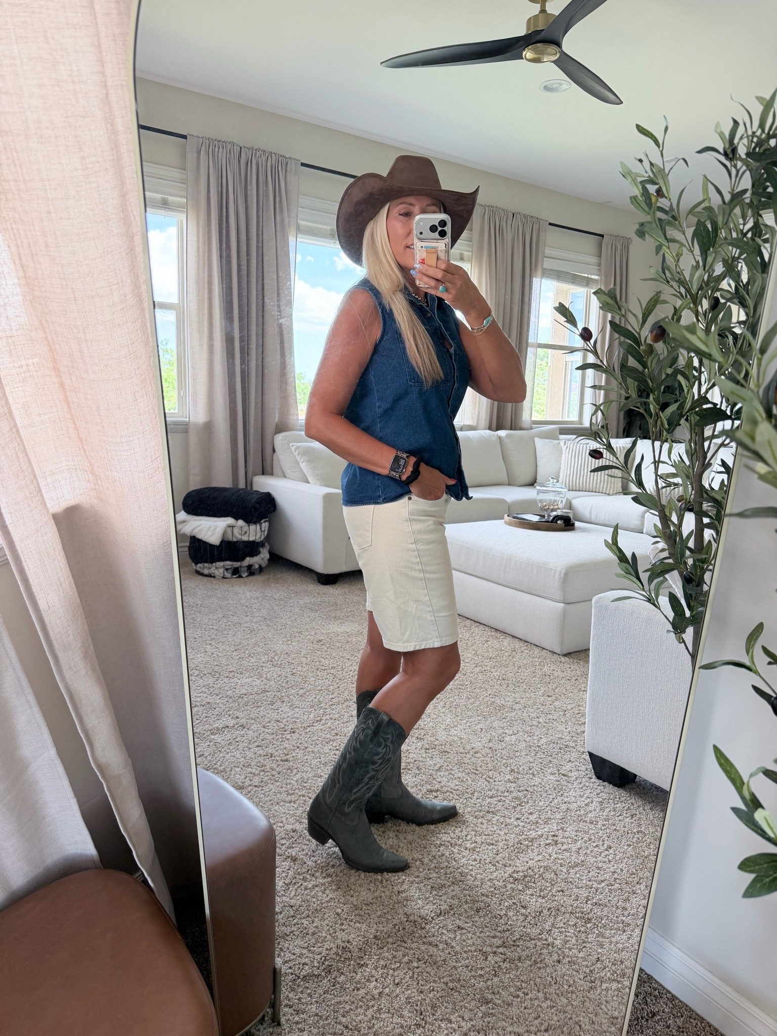 Cute boots, comfy shorts and top! Ready for country music or the rodeo.
