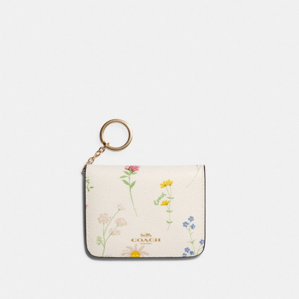 corner zip wristlet in signature canvas | Coach Outlet US