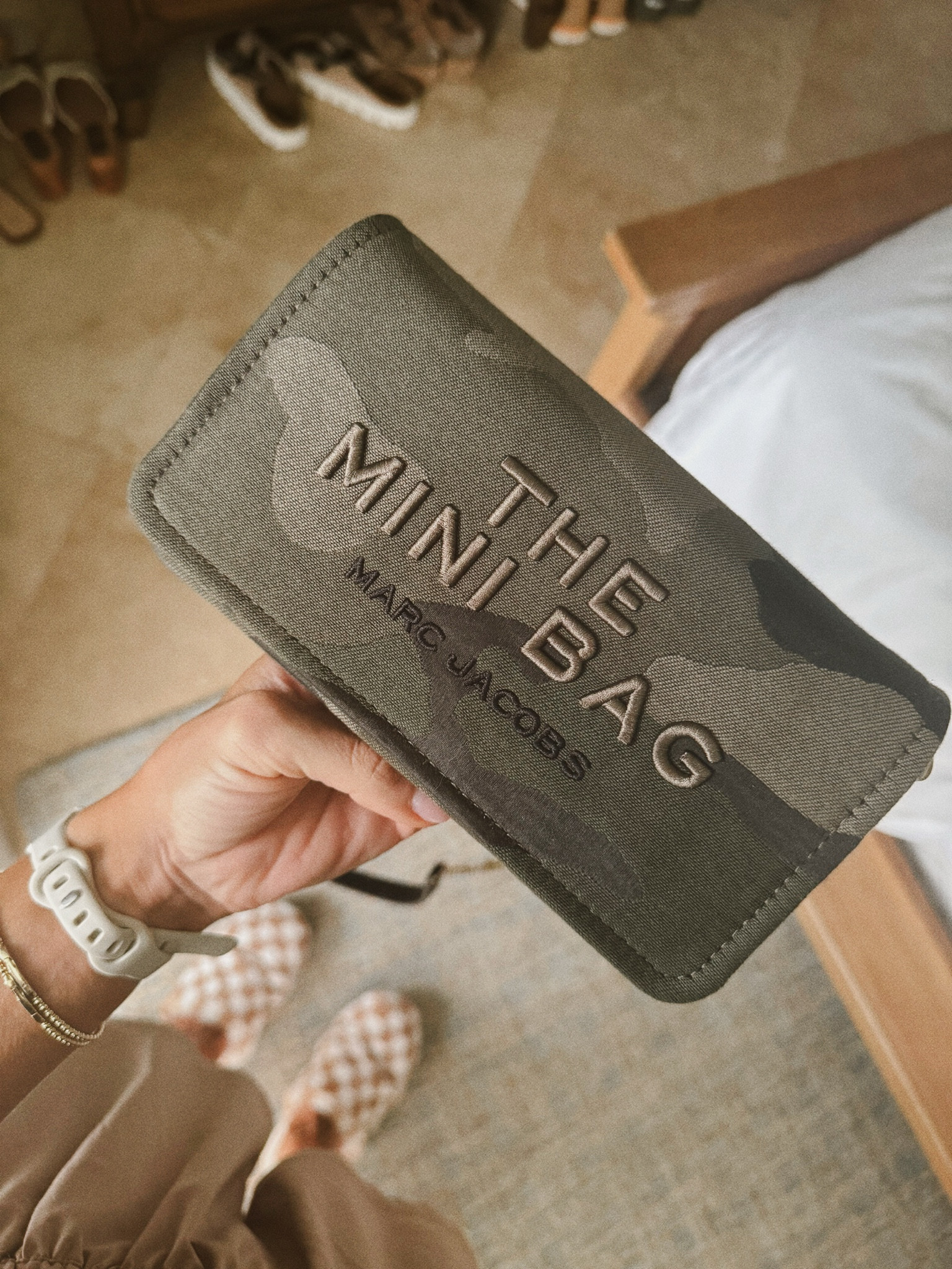 The most perfect size little bag🖤 Jd got this for me as a gift (camo, YESSS) & it has little slots inside for your cards, fits my iPhone 15 & has a strap! Several color options as well! Under $200🤌🏼

Marc Jacob’s / the tote bag / the mini bag / travel / purse / bag / vacation / Holley Gabrielle / honeymoon

#LTKItBag #LTKStyleTip #LTKTravel