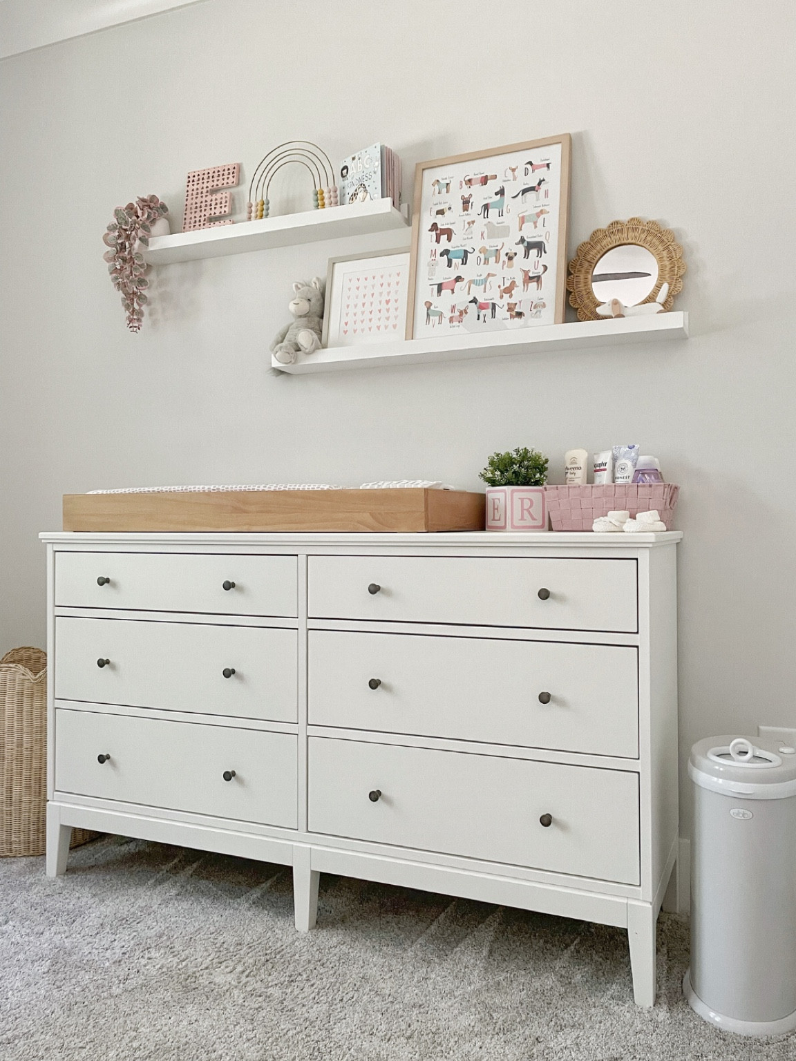 Nursery changing station.

Nursery decor, scallop basket, changing table topper, picture frames, baby.

#LTKbump #LTKbaby #LTKhome